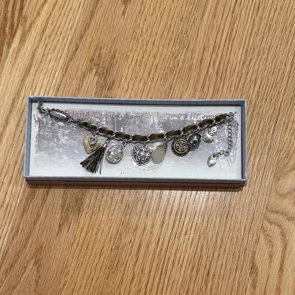 Silver tone Charm Bracelet with Tassel